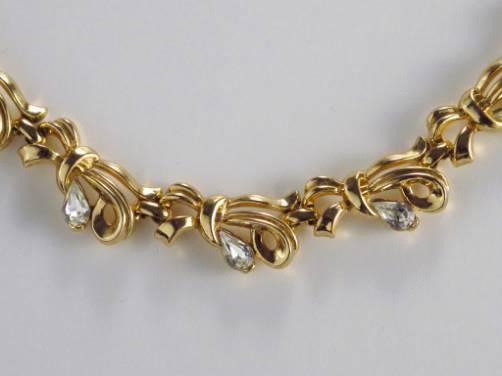 Trifari vintage bow with rhinestones gold tone necklace 1950`s ca, American